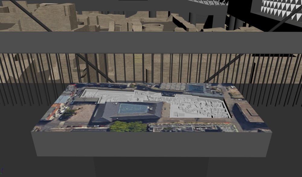 Medientisch im zukünftigen Museum mit einem Modell des gesamten archäologischen Rundgangs eingebettet in die bestehende Bebauung am Rathausplatz