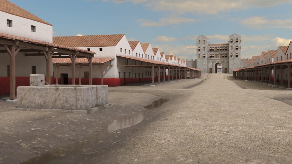 Screenshot aus einem Rekonstruktionsprojekt: Blick zwischen zwei Häuserreihen hindurch auf ein Tor zu. Links im Bild ein Brunnen. Alle Häuser sind weiß und nur am unteren Rand mit roter Farbe bemalt. Alle haben ein Vordach. 